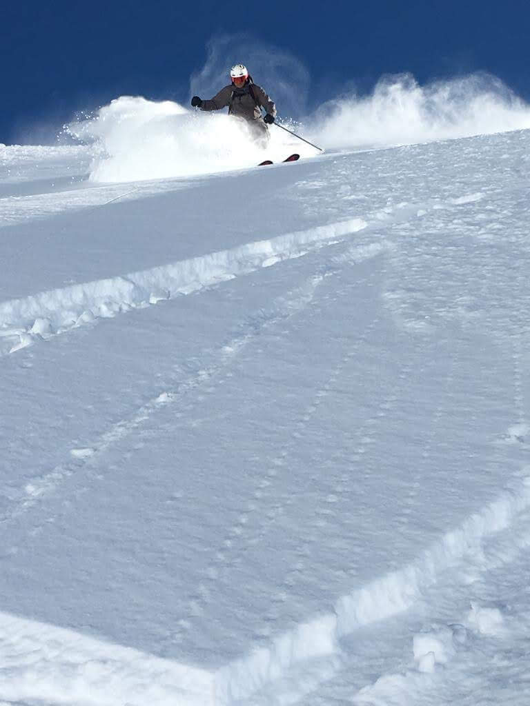 Roddy Willis skiing deep powder in Verbier's backcountry